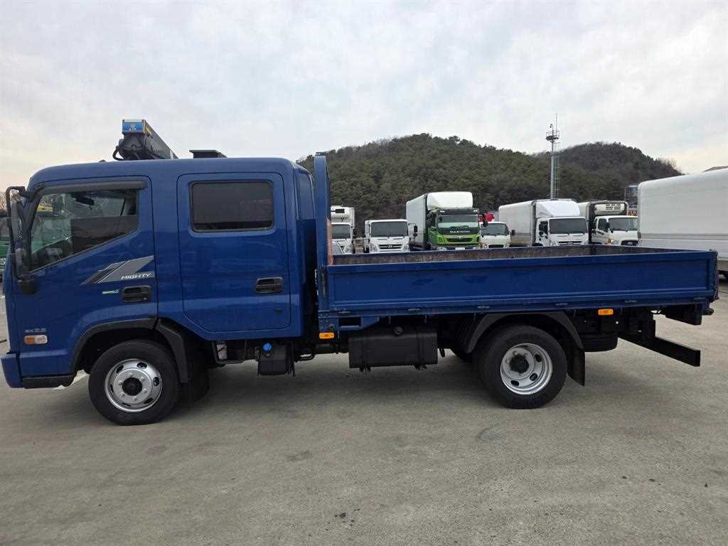 현대 마이티 2.5톤 카고 2019년식 운전석 쪽 옆면
